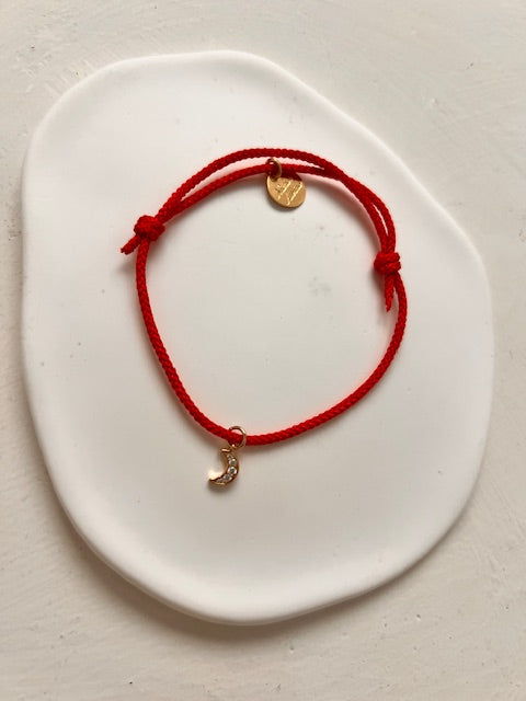 Pulsera de la buena suerte en hilo rojo ajustable.